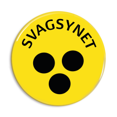 Svagsynet - Gult badge med tekst og sorte prikker